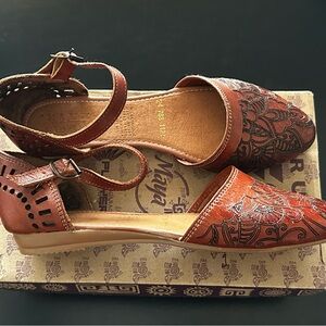 Women's Brown Leather Ankle-Strap Flats with Embossed Floral Detail